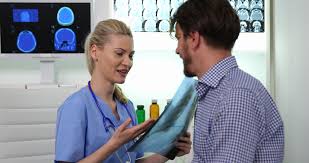 Medical Doctor Woman Optimistic Talk To Patient Hold Pulmonary X Ray In Hospital Stock Footage Optimistic Talk Patient Medica Doctor Medical Pulmonary Medical