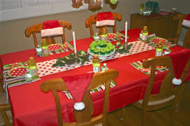 A Red Table Cloth Polka Dot Runner And Grinch Colored Paper Products Went A Long Way To Decorate Sophie S Table Red Table Grinch Party Colored Paper