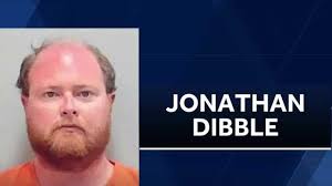 Florida high school janitor arrested