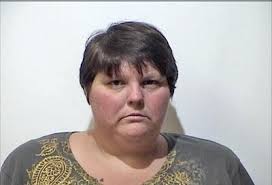 Woman accused of pointing gun at ex-husband