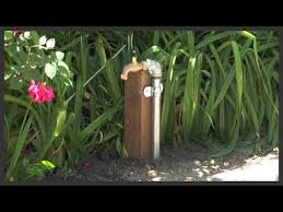 Optionally the hose bib extender easily slides over a fencing t post. How To Move A Lawn Sprinkler Tap Faucet Youtube