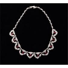 Antique ruby and diamond necklace. One 18k White Gold Vintage Ruby And Diamond Necklace Set With 10 Oval Rubies Weighing 4 05ct And