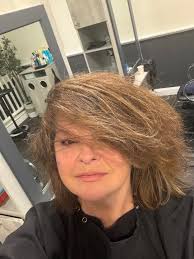 Holiday hair, made easy.✨🎄 This Cezanne Smoothing Treatment, done by  Heather