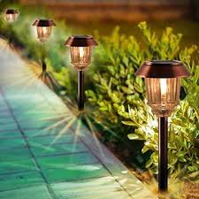 Xmcosy Xllnn8s Solar Lights Outdoor Solar Garden Lights Pathway Lights Outdoor 4 Pack Ip65 Waterproof Glass Cover 8 10 Hours Long
