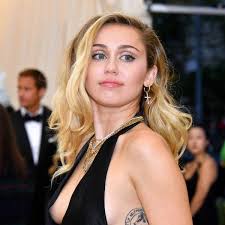 An easy diy way to get the hairstyle of the moment, or just a very bad idea? Miley Cyrus Wears Retro Shag Mullet Ponytail Hairstyle