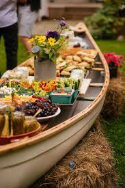 Follow these tips for success. How To Set Up An Outdoor Buffet In A Canoe Simple Bites Wedding Food Bars Outdoor Buffet Wedding Buffet