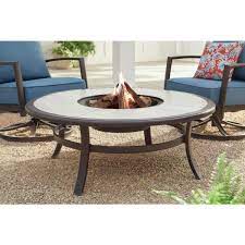 Light the fire pit table and run the burner on high for 30 minutes. Hampton Bay Whitfield 48 In Round Galvanized Steel Wood Burning Fire Pit Table In Dark Brown With Stone Look Tile Top 3022 Cm4 Fp The Home Depot