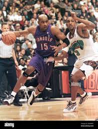 Toronto Raptors Vince Carter 15 Drives Around Vancouver Grizzlies Shareef Abdur Rahim During First Half Play Of Their Nba Game From Vancouver March 5 Ls Mmr Stock Photo Alamy