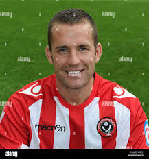 Michael Doyle is a professional footballer known for his skills in the  midfield. Over his career, he played for various clubs in England,  showcasing his consistent performance in the sport Stock Photo -