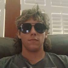 CAT excavator crushes the roof of old truck