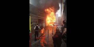 100 firefighters tackle blaze as huge plume of smoke rises near london station. A7ah5us7xcrmim