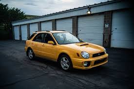 Image result for Herald Yellow 1975 Subaru