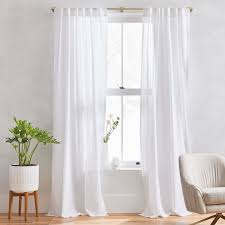 Burlap is a popular fabric for the farmhouse window. 20 Window Treatment Ideas