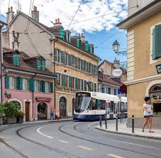 Geneva And Its Lake Carouge Ans Its Typical Bohemian Atmosphere Geneva Ttot Visitgeneva Geneve Swissriviera Carouge Switzerland Ge Tram Basel Schweiz