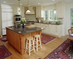White Cabinets Classic Crown Molding And A Maple Island With Turned Pilasters And Wa Contemporary Kitchen Design Kitchen Design Styles Popular Kitchen Designs