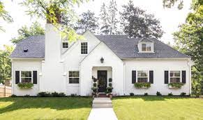 Small wood bungalow with luxury furniture. Before And After Minneapolis Bungalow Exterior Bria Hammel Interiors