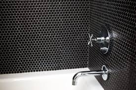 Black And White Penny Round Tile This Black White Home Is Timeless Penny Round Penny Round Mosaic Penny Round Tile Bathroom