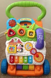 The Vtech Sit To Stand Learning Walker Is The Best Toy For Babies Best Gifts Top Toys Best Kids Toys One Year Old Baby Baby Boy Walker