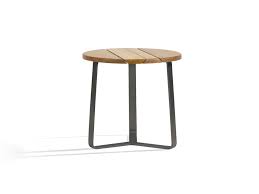 This coffee table is finely constructed from quality mango wood and supported by splayed metal legs. Round 42 Round Coffee Table By Manutti