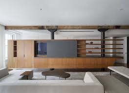 Gallery featuring images of 38 beautiful living rooms with exposed brick walls, showcasing the variety of styles available. Living In A Single Room 25 Unique Loft Designs Archdaily