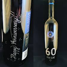 An artfully engraved wine bottle with a special message right on the bottle makes a memorable and thoughtful gift for loved ones. Wine Bottle Engraving Georgia Engraving Printing And Promotional Gifts Inkwell Designers
