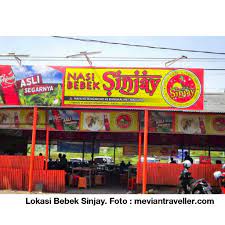 Taman nasional bromo tengger semeru, selat madura saat matahari terbenam, salju tipis di ranu pani, jembatan suramadu, museum binatang jatim park 2 di kota batu, danau belerang di kawah gunung ijen, sabana di taman nasional baluran. Bebek Goreng Sinjay Ratu Bebek Khas Bangkalan