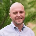 Dr. Travis S. Mickelson, MD