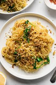 Once the water is boiling, stir in the angel hair pasta, and return to a boil. Angel Hair Noodles With Arugula And Pistachio The Live In Kitchen