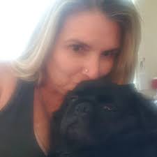 How to manage a young pug's barking and energy levels?