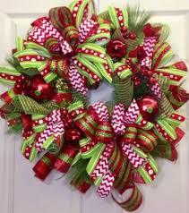 This wreath combines gathered mesh fabric with a geometric ribbon accent for a new take on traditional burlap decor. 60 Christmas Mesh Wreaths Ideas Christmas Mesh Wreaths Wreaths Mesh Wreaths