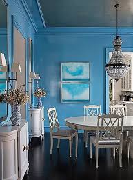 Sky Blue Dining Room With All White Dining Table Chairs Buffets And A Crystal Chandelier Dining Room Blue Dining Room Paint Colors Living Room Colors