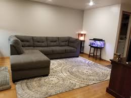 One wall is all grey cinderblock, the opposite wall is a light sage/green color. Rug Color For Charcoal Gray Couch