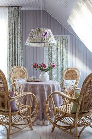In the living room, she added a paola navone sofa and a slipper chair by paul marra design to play off the extravagant fireplace. Decorating With Lavender Town Country Living