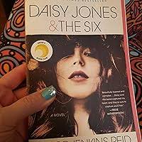 Daisy Jones & The Six: Reese's Book Club: A Novel: Reid, Taylor Jenkins:  9781524798628: Amazon.com: Books