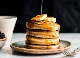 These fluffy, slightly sweet pancakes are topped with coconut cream and toasted coconut (instead of syrup), which helps keep the sugar count low without. Ngoa S9uf Yflm