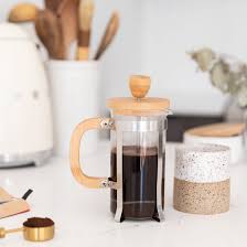Swirl the hot water around inside the french press for about 10 seconds, then pull the plunger up and remove the lid. How To Clean A French Press