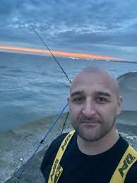 Ian at Swan with his first fish of the year