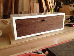 Small kitchens can be challenging when it comes to storage, but you can easily create more by adding a small extra shelf in your upper cabinets. Custom Made Small Floating Bathroom Shelf Cabinet By Sawn Custom Woodwork Custommade Com