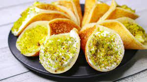 But some of our favorite foods from the region are the sweets. Qatayef Middle Eastern Dessert Qatayef With Cream Arabic Dessert Recipe Yummy Youtube