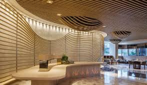 A Central Theme Of The Design Here Is Specifically About Creating A Natural And Harmonious Environment Tai Hospital Interior Design Design Waiting Area Design