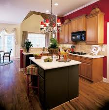 Even though you're just borrowing this kitchen for now, there are ways to make it your own! Red Kitchen Decorating Theme Julia Palosini