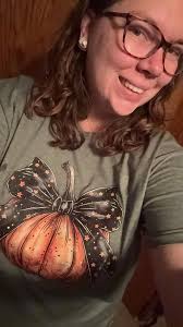 Fall festival outfit ideas with pumpkin accessories