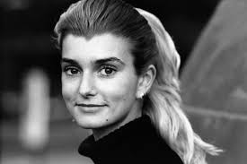 I have always wondering how the late Sinead with hair. So I added with  photoshop Generative fill. Her actual looks was more stunning than these  for sure.