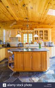 Aug 15, 2016 · the best way to line kitchen cabinets? Maple Wood Island With Polished Granite Countertop And Cupboards In Kitchen With Slate Tile Floor Inside A Piece Sur Piece Eastern White Pine Log And Timber Home Quebec Canada This Image Is