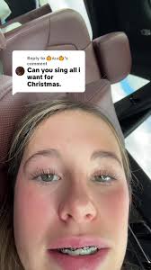 Family Singing in Stairs All I Want for Christmas