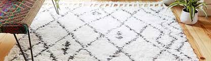 Boho style is famous for its bold colors and ornate patterns; The Best Modern Area Rugs For Your Living Room World Market