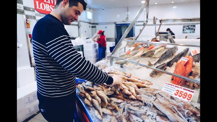 Mga resulta ng larawan para sa Fish Chef in fish market, looking for quality fish"