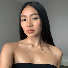 According to nadine, the rose on her wrist is an act of giving herself a flower every time she struggles in loving herself. Nadine Lustre Responds To Plastic Surgery Rumors
