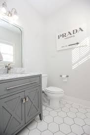 Black And White Bathroom Tiles Floor The Mila Powder Room Black Tile Bathrooms White Bathroom Tiles White Tile Bathroom Floor