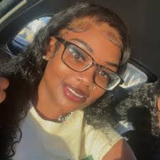 Who braids over locs in Opelousas, LA?